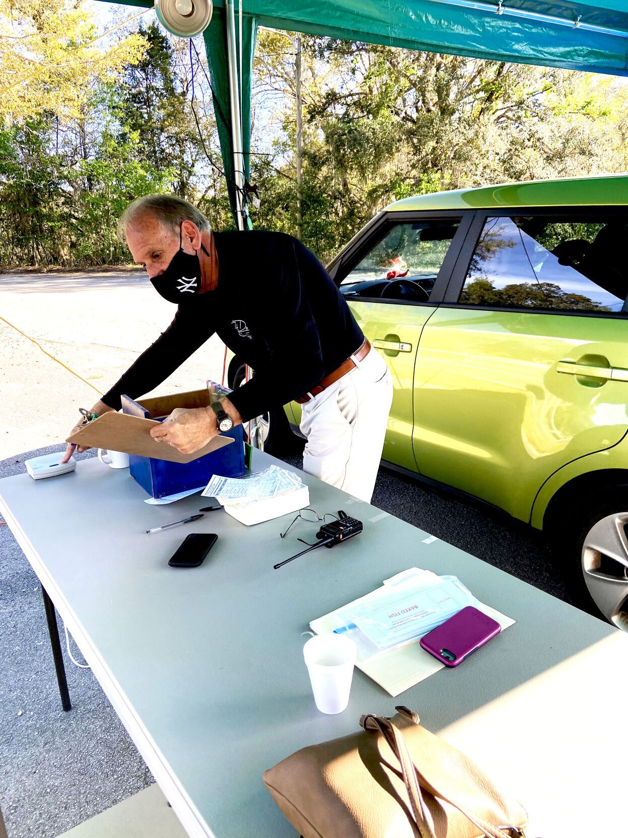 fish fry -- james manos pressing button.jpg